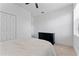 Bedroom with a ceiling fan, a window with blinds, and carpet floors at 17731 Bright Wheat Dr, Lithia, FL 33547