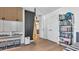 bedroom with wooden floors, large closet, storage space, and decorative hammock at 18017 Ramble On Way, Land O Lakes, FL 34638
