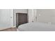 Comfortable bedroom featuring a wooden dresser, and two white paneled doors at 18017 Ramble On Way, Land O Lakes, FL 34638
