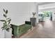 Inviting entryway features modern decor, stylish furniture, and views into the spacious living area at 18017 Ramble On Way, Land O Lakes, FL 34638