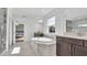 Bright main bathroom includes separate shower, soaking tub, and dual vanity sinks at 18017 Ramble On Way, Land O Lakes, FL 34638