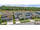 Street view of lovely two-story homes with manicured lawns and nicely paved driveways at 18017 Ramble On Way, Land O Lakes, FL 34638