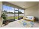 Relaxing screened lanai with comfortable seating and backyard views at 18677 Milton Keynes Ct, Land O Lakes, FL 34638