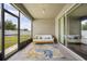 Relaxing screened lanai with comfortable seating and backyard views at 18677 Milton Keynes Ct, Land O Lakes, FL 34638