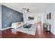 Open floor plan with view of the living room, kitchen, and dining area providing ample living space at 18677 Milton Keynes Ct, Land O Lakes, FL 34638