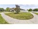 Well maintained yard with a privacy fence and lush landscaping at 18677 Milton Keynes Ct, Land O Lakes, FL 34638