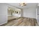 Beautiful home featuring an open-concept layout with wood floors and neutral walls, perfect for modern living at 1980 Taylor Lake Cir, Largo, FL 33778