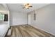 Spacious room featuring wood floors and neutral paint, perfect for entertaining or relaxing at 1980 Taylor Lake Cir, Largo, FL 33778