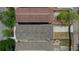 Birds eye of houses with distinct roof types surrounded by greenery at 2130 W Spruce St, Tampa, FL 33607
