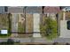 Aerial view showcases backyard spaces featuring patios and green landscaping at 2130 W Spruce St, Tampa, FL 33607
