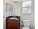 Bright bathroom features a vanity, mirror and window at 2130 W Spruce St, Tampa, FL 33607