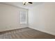 Bedroom with neutral walls, plush carpet, and lots of natural light at 2130 W Spruce St, Tampa, FL 33607