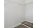 A walk-in closet with carpet, trim, and shelving at 2130 W Spruce St, Tampa, FL 33607