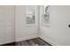 Bright entryway with natural light streaming through windows, highlighting the door at 2130 W Spruce St, Tampa, FL 33607