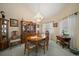 Dining room featuring a chandelier and a wooden china cabinet at 2175 Oak Forest Ln, Palm Harbor, FL 34683