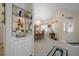 Open-concept dining area featuring a wet bar with a mirrored backsplash at 2175 Oak Forest Ln, Palm Harbor, FL 34683