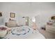 Bright main bedroom with ensuite bathroom, walk-in closet, and views of the staircase at 2175 Oak Forest Ln, Palm Harbor, FL 34683