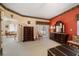 Spacious main bedroom featuring classic furnishings, and an attached sunroom at 2175 Oak Forest Ln, Palm Harbor, FL 34683