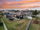 A fenced backyard with a screened-in pool and covered patio create a tranquil outdoor living space at 21834 Southern Charm Dr, Land O Lakes, FL 34637