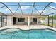 Beautiful screened-in pool area with a covered patio and plenty of seating for entertaining at 21834 Southern Charm Dr, Land O Lakes, FL 34637