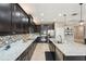 Modern kitchen featuring stainless steel appliances, granite countertops, and ample cabinet space at 21834 Southern Charm Dr, Land O Lakes, FL 34637