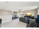 Bright room with exercise area, tv setup, and comfortable seating at 21834 Southern Charm Dr, Land O Lakes, FL 34637