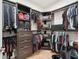 Spacious walk-in closet with custom shelving and ample storage for clothes and accessories at 21834 Southern Charm Dr, Land O Lakes, FL 34637