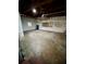 Large unfinished basement area with concrete floors and walls, offering versatile storage at 2400 13Th S Ave, St Petersburg, FL 33712