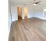 Spacious bedroom featuring hardwood flooring and a ceiling fan at 2400 13Th S Ave, St Petersburg, FL 33712