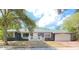 Charming single-story home with a well-maintained front yard and a quaint, covered front porch at 2400 13Th S Ave, St Petersburg, FL 33712