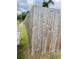 The property is bordered by a sturdy wooden fence providing security at 2400 13Th S Ave, St Petersburg, FL 33712