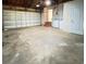 Spacious garage featuring laundry hook-ups offering ample space for parking and projects at 2400 13Th S Ave, St Petersburg, FL 33712