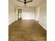 Spacious living room featuring hardwood flooring and ample natural light at 2400 13Th S Ave, St Petersburg, FL 33712