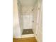 Shower stall featuring modern marble-patterned tiling, updated fixtures and floor at 2400 13Th S Ave, St Petersburg, FL 33712