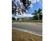Charming neighborhood street view featuring a home with a fenced yard, offering privacy at 2400 13Th S Ave, St Petersburg, FL 33712
