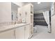 Cozy bathroom featuring a vanity with ample storage and tiled shower at 2715 9Th N Ave, St Petersburg, FL 33713