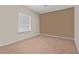 Neutral bedroom showcasing natural light from the bright window at 2715 9Th N Ave, St Petersburg, FL 33713