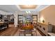 Elegant dining room area showcasing stylish barn doors to the living room and adjacent open kitchen at 2715 9Th N Ave, St Petersburg, FL 33713