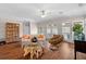 Comfortable living room featuring hardwood floors, bright windows, and stylish furnishings at 2715 9Th N Ave, St Petersburg, FL 33713