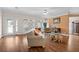 Inviting living room featuring hardwood floors, plenty of natural light, and comfortable seating at 2715 9Th N Ave, St Petersburg, FL 33713