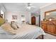 Serene main bedroom showcasing neutral decor, a comfortable bed, and abundant natural light at 2715 9Th N Ave, St Petersburg, FL 33713
