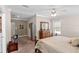 Well-lit main bedroom with a comfortable bed, dresser, and neutral tones creating a relaxing atmosphere at 2715 9Th N Ave, St Petersburg, FL 33713