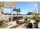 Relaxing patio area with comfortable outdoor furniture and a modern hot tub, perfect for entertaining at 2715 9Th N Ave, St Petersburg, FL 33713