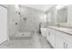 Luxurious bathroom featuring a shower, soaking tub, and dual vanity at 27330 Coral Springs Dr, Wesley Chapel, FL 33544