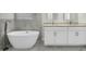 Luxury bathroom featuring a soaking tub, dual vanities and marble floors at 27330 Coral Springs Dr, Wesley Chapel, FL 33544