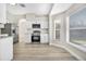 Bright kitchen with white cabinetry, modern appliances, and ample natural light at 27330 Coral Springs Dr, Wesley Chapel, FL 33544
