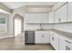 Modern kitchen featuring white cabinets and stainless steel appliances at 27330 Coral Springs Dr, Wesley Chapel, FL 33544