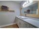 Bathroom with a white vanity, vessel sink, and convenient towel storage at 2755 Via Capri # 1223, Clearwater, FL 33764