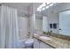 Bathroom featuring a shower, toilet, and vanity with granite countertop at 2755 Via Capri # 1223, Clearwater, FL 33764