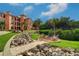 Inviting outdoor fire pit area with seating, perfect for relaxing and enjoying the community's beautiful surroundings at 2755 Via Capri # 1223, Clearwater, FL 33764